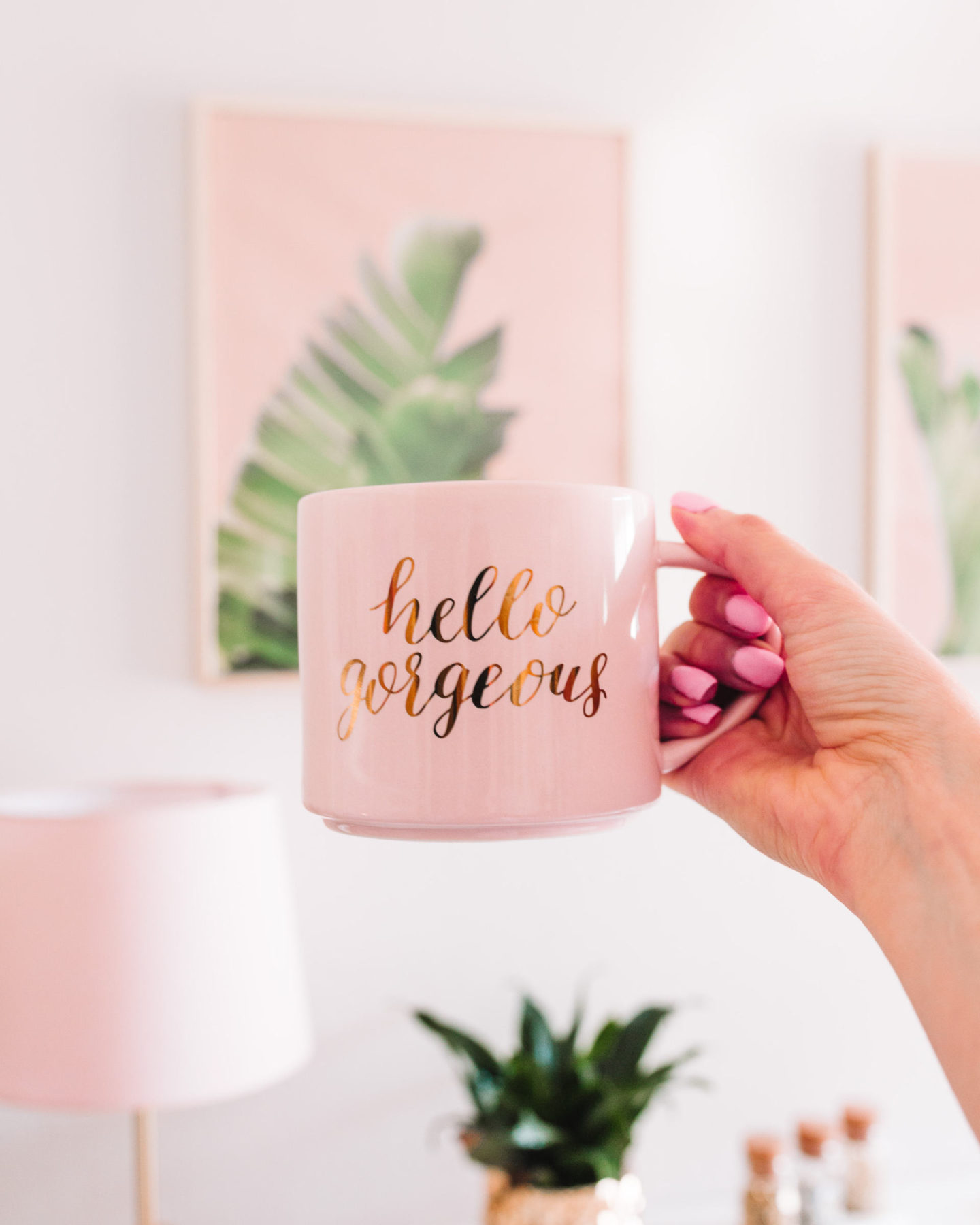 https://lovejenmarie.com/wp-content/uploads/2019/10/pink-gold-home-office-decor-office-reveal-hello-gorgeous-mug-tropical-home-office-bohemian-home-office-1440x1800.jpg